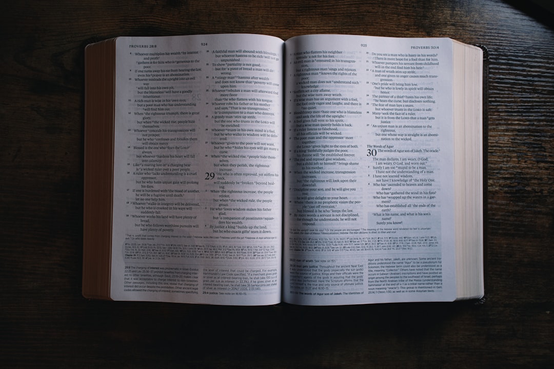 Conclusion by Bible Verse Daily an open book sitting on top of a wooden table